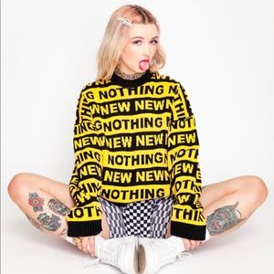 Ragged priest sweater